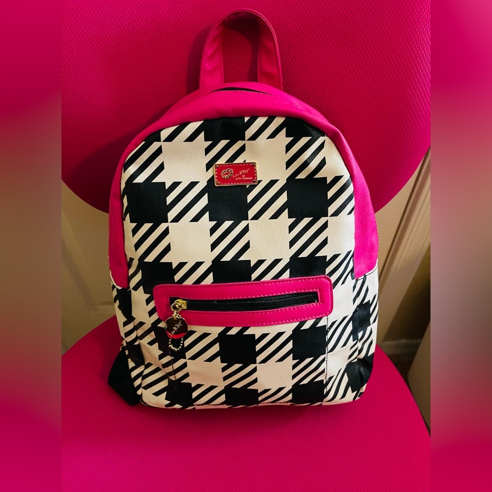 Like new Authentic LUV BETSEY backpack 
BY BETSEY JOHNSON💋
